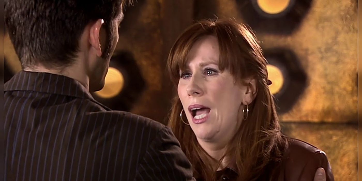 The Doctor holds Donna as she forgets