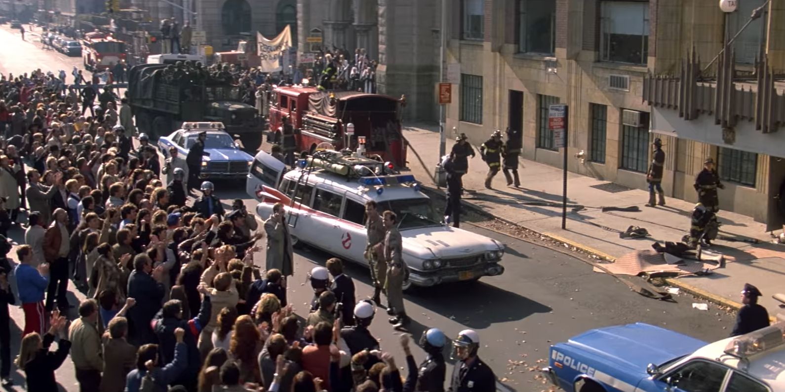The Ghostbusters arriving with Ecto-1 at the Shandor building in Ghostbusters 1984