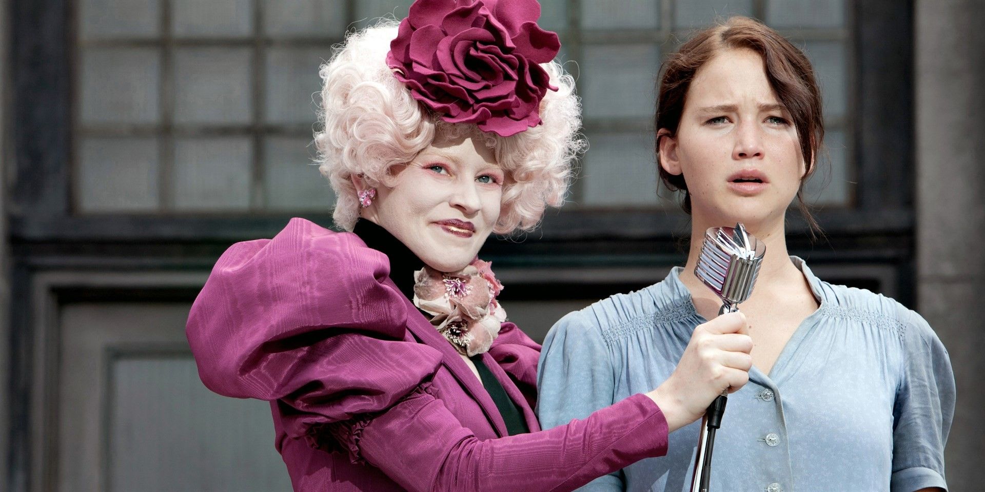 Effie and Katniss in The Hunger Games