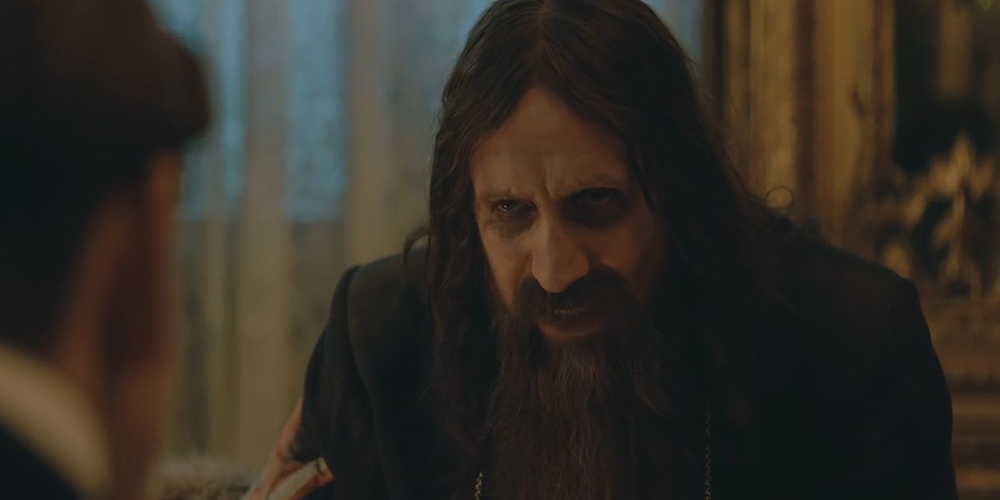 Rasputin talks to Conrad over dinner in The King's Man