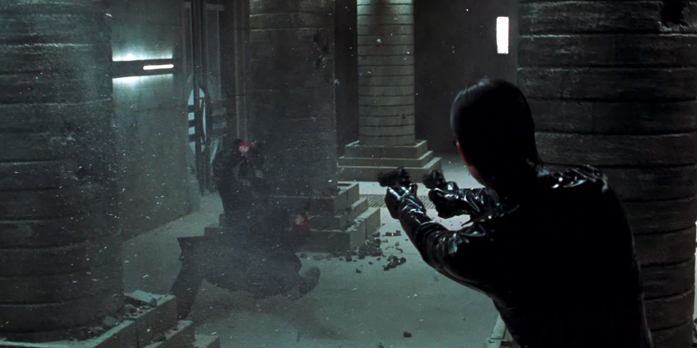 Trinity shoots a thug in The Matrix Revolutions