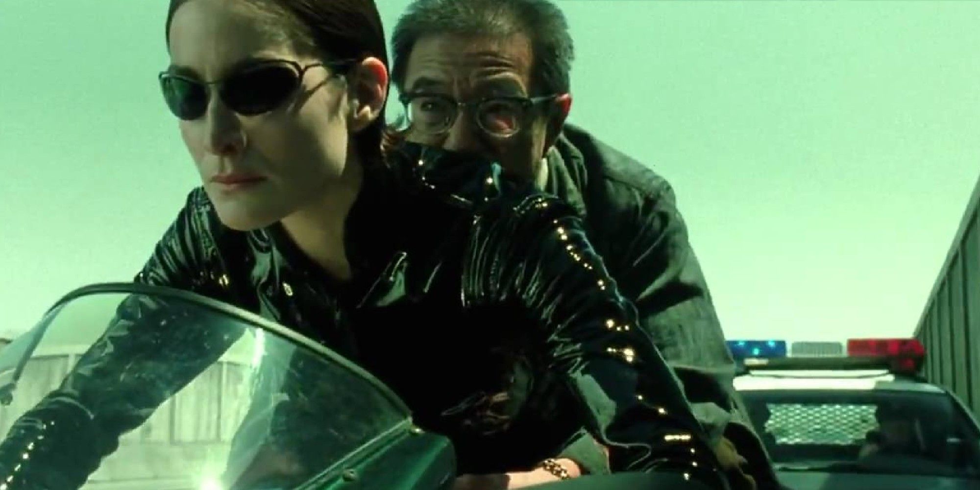 Trinity and the Keymaker on a motorcycle in The Matrix: Reloaded