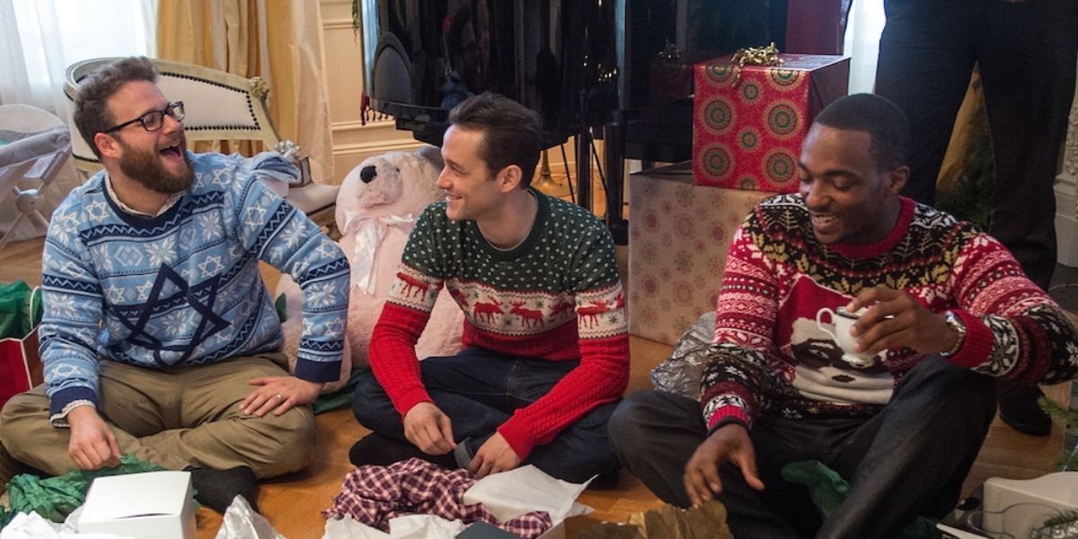 Issac, Ethan, and Chris opening Christmas presents in The Night Before (2015)