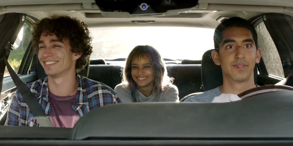 Two guys and a girl inside a car in The Road Within