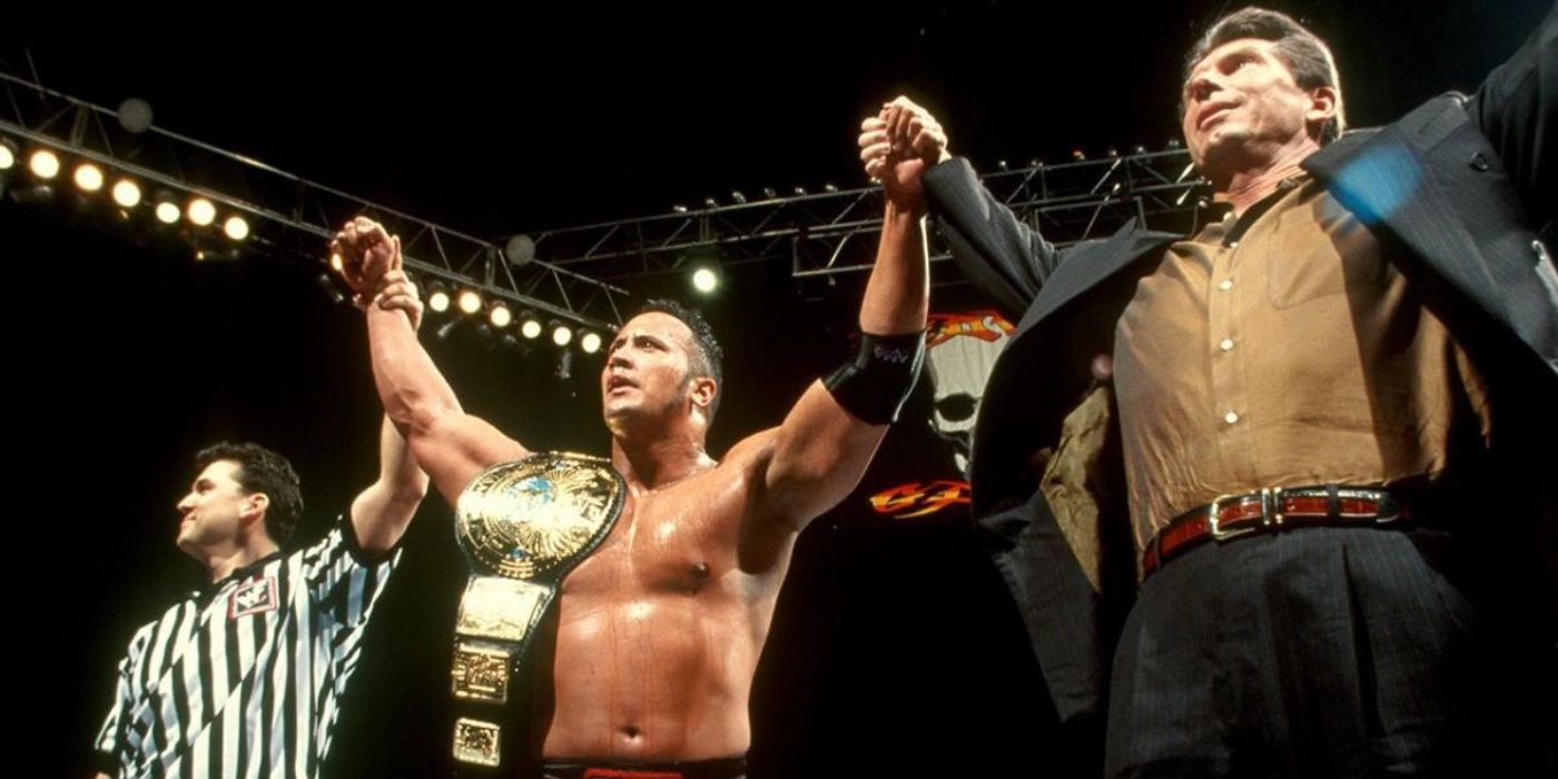 The Rock with Shane and Vince McMahon at Survivor Series 1998