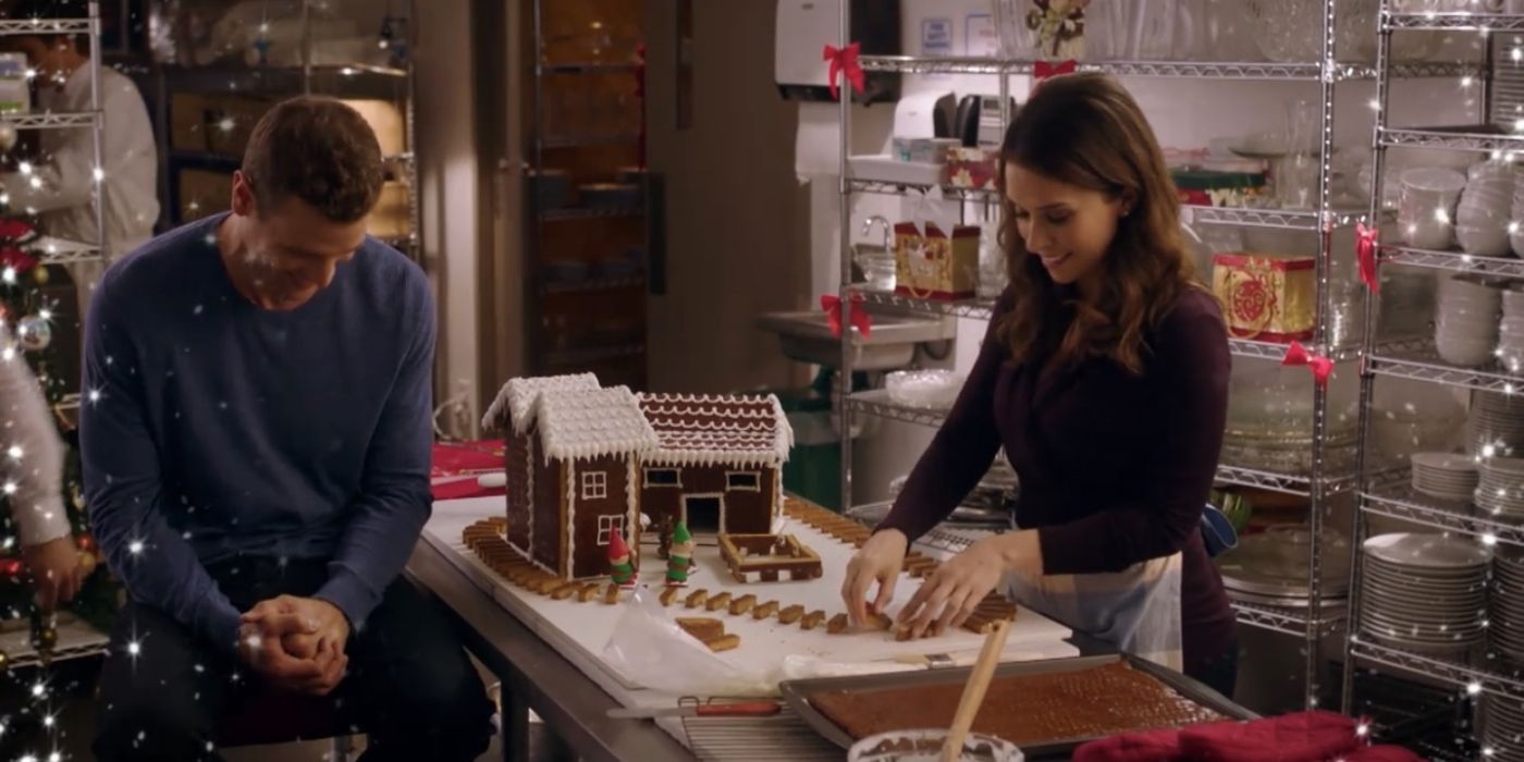 Kylie baking and talking to Nick in The Sweetest Christmas