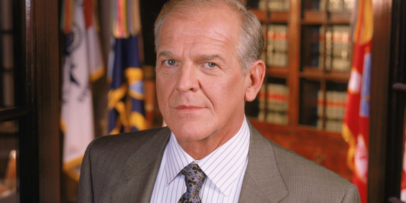 Leo McGarry posing for a photo in The West Wing