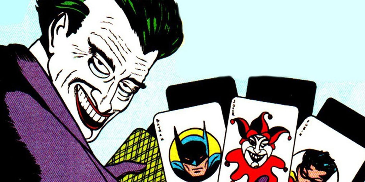 The original Joker holding playing cards.