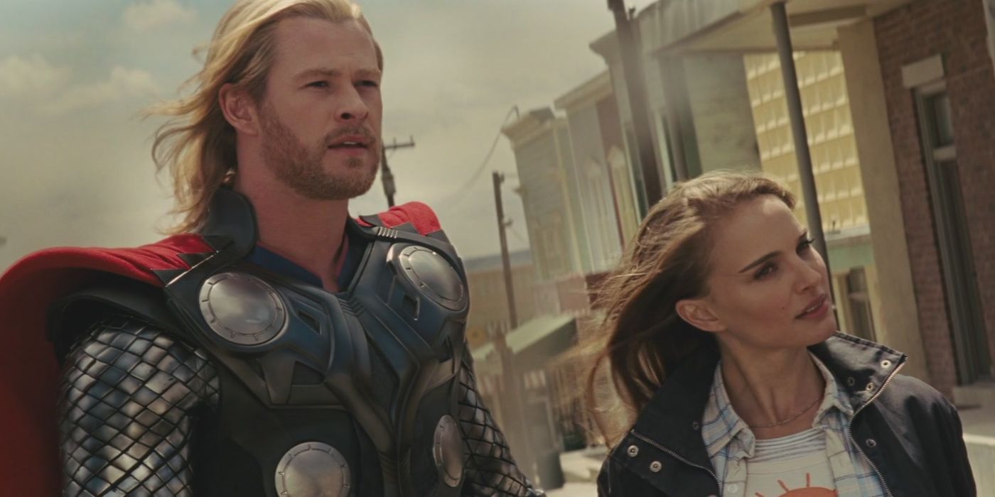 Thor and Jane standing in town in Thor (2011)