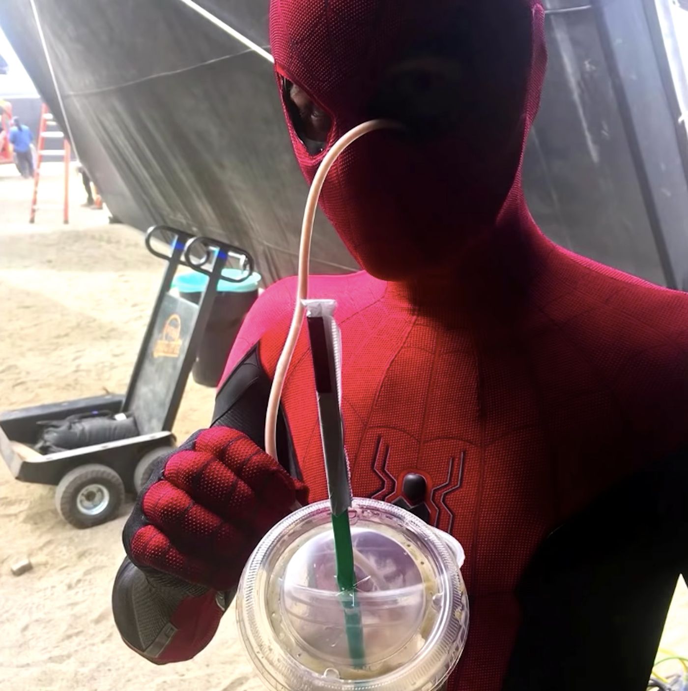 Tom Holland Drinking Coffee in Spider-Man Suit Full Size