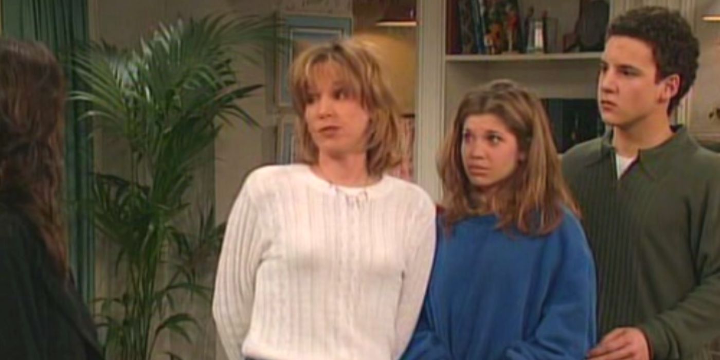 Topanga and Cory standing behind Amy in Boy Meets World