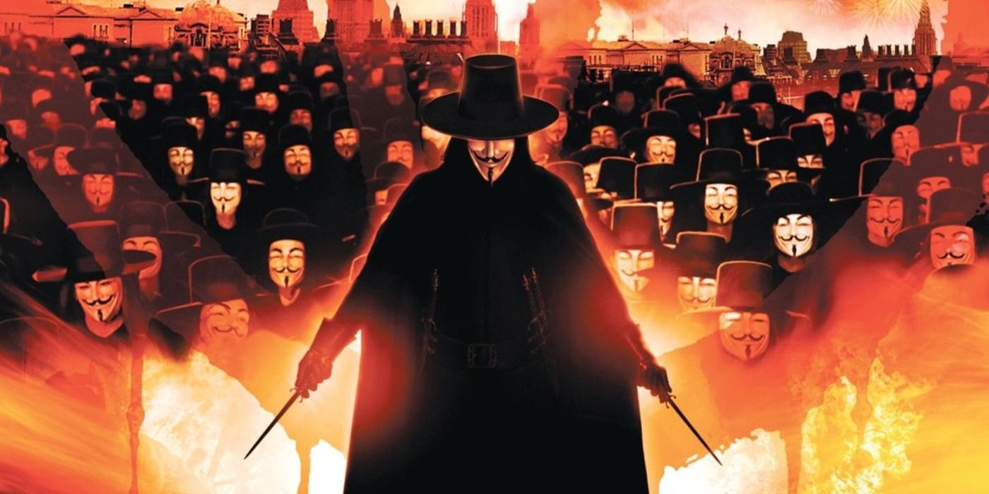 V in his Guy Fawkes mask wielding two knives, supported by his anarchistic followers behind him