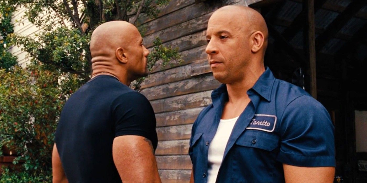 Vin Diesel and Dwayne Johnson standing beside each other in Fast & Furious