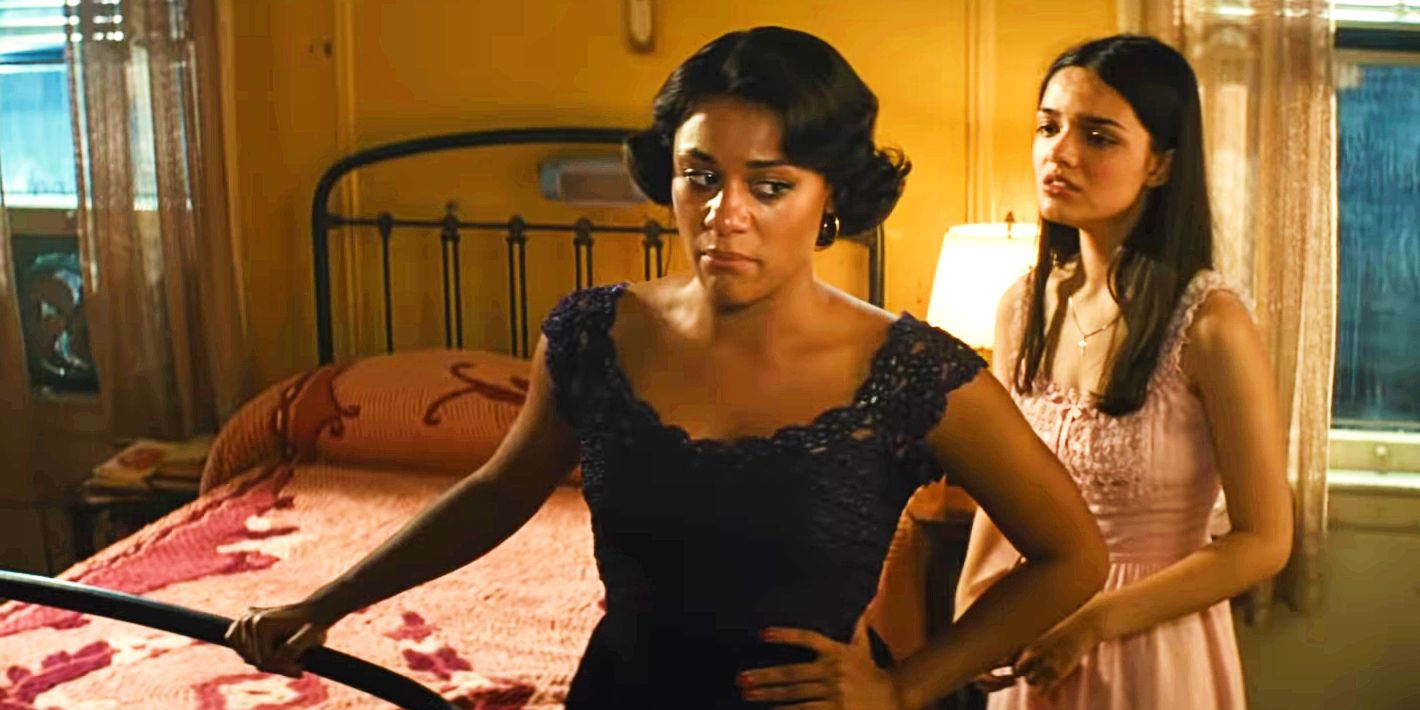 Anita and Maria talking in a bedroom in West Side Story