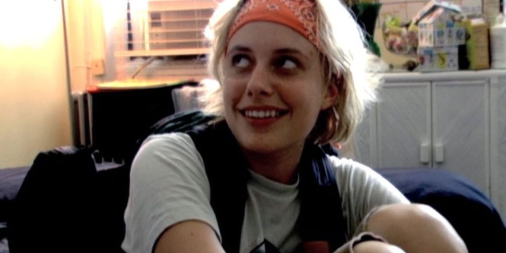 Greta Gerwig wearing a headband and looks askance at something off-screen in 2008's Yeast