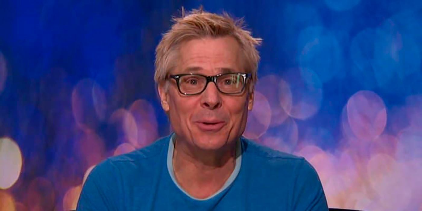 Kate Kaelin in the Diary Room on Celebrity Big Brother, wearing glasses and a light blue shirt.
