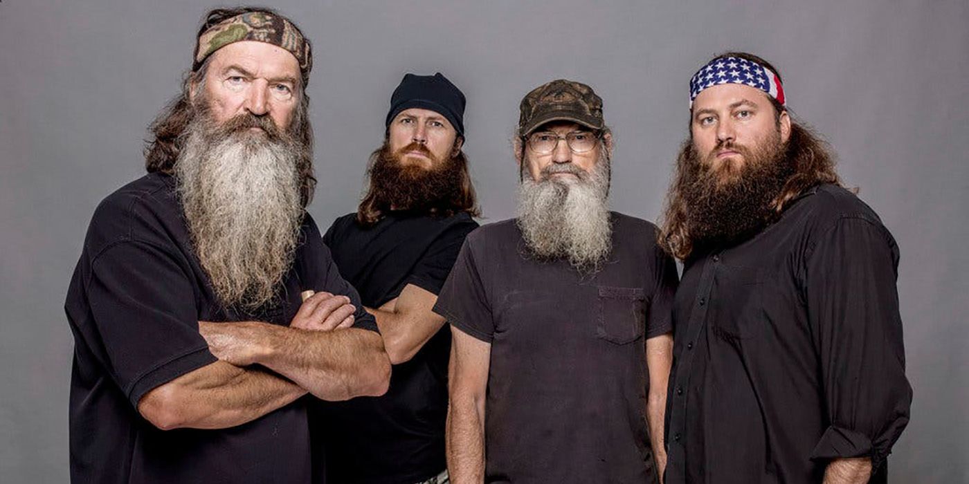 The four main male characters from Duck Dynasty posing on a grey background in a promo poster.