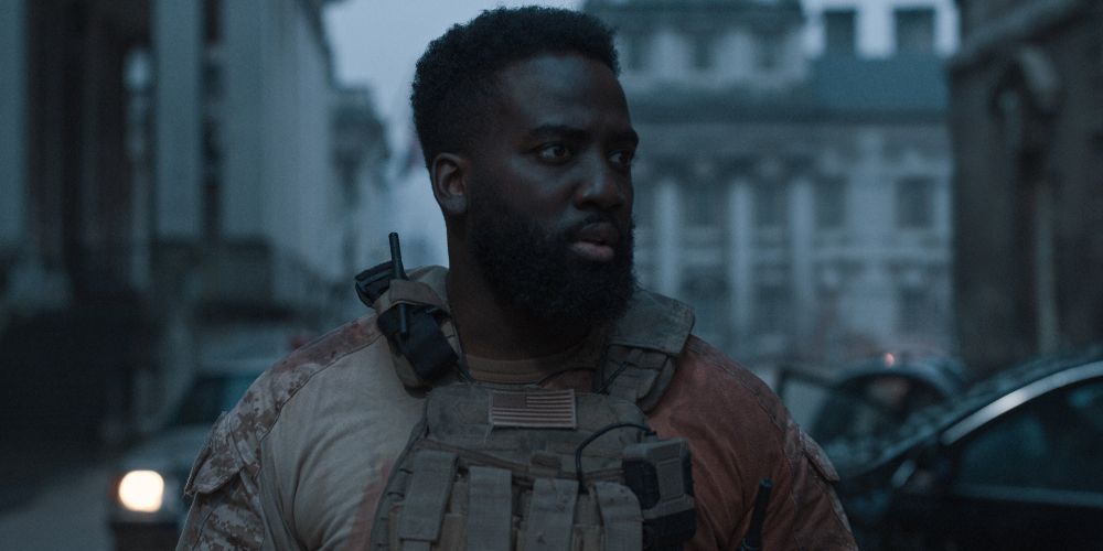 Trevante wears a tactical vest outdoors on Invasion