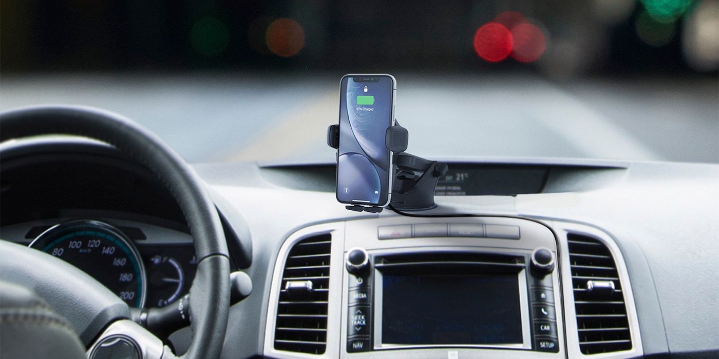 The iOttie phone mount attaches to your car's dashboard and your phone sits inside your car.