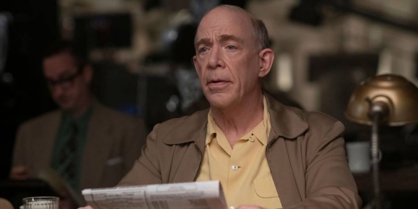 J.K. Simmons looking up from his paper in Being the Ricardos