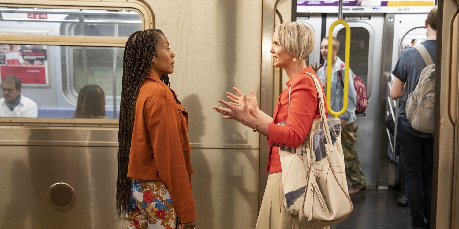 Miranda and her professor talking on the subway platform in a scene from And Just Like That.