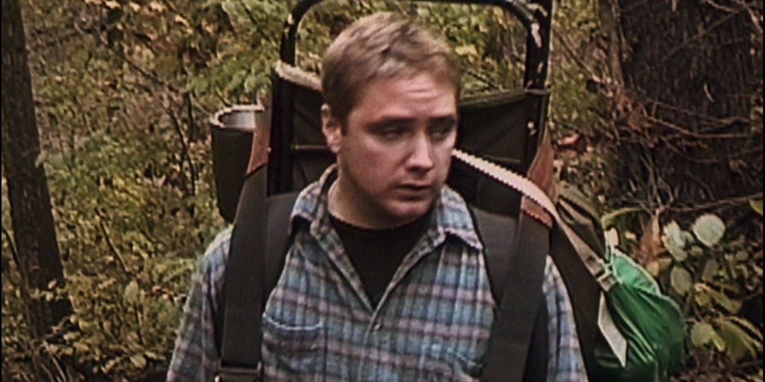 Mike walking outside in the woods in The Blair Witch Project