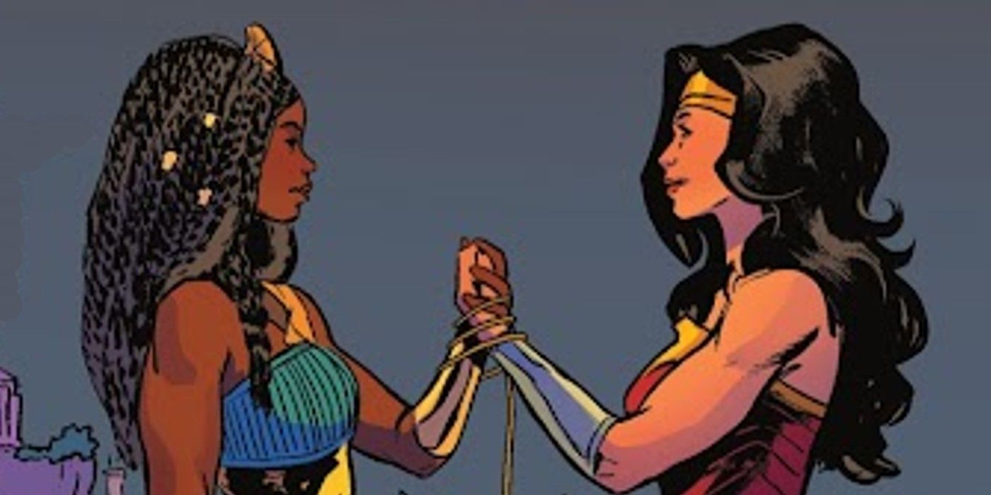 Diana and Nubia clasp hands.