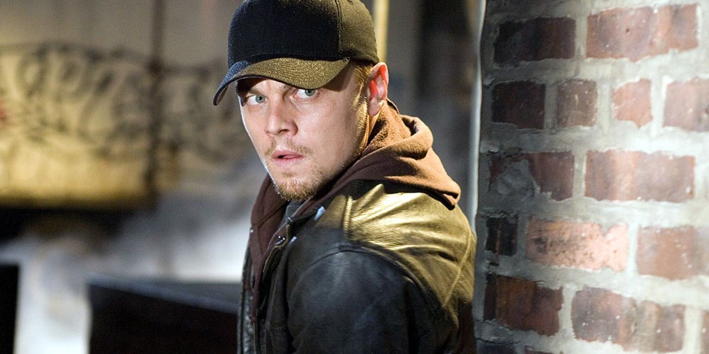 DiCaprio as Billy in an alley way in The Departed.
