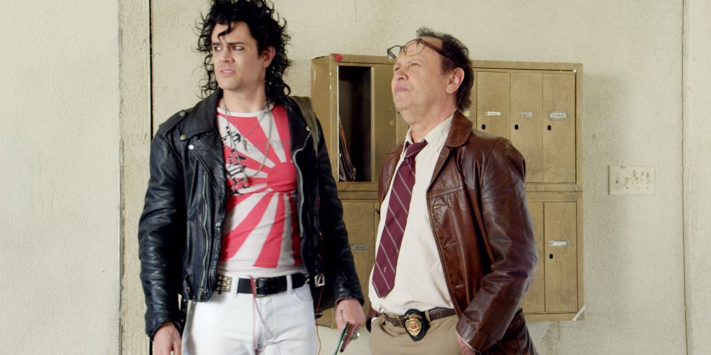 Johnny Knoxville in costume next to Billy Crystal in Grand Theft Parsons.