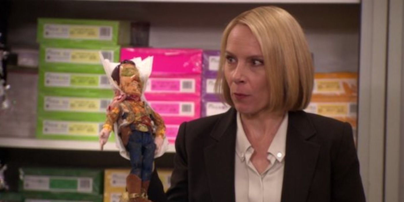 Holly shows off the dirty Woody doll in The Office