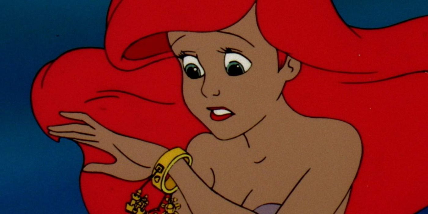 Ariel looking worriedly at her bracelet in The Little Mermaid