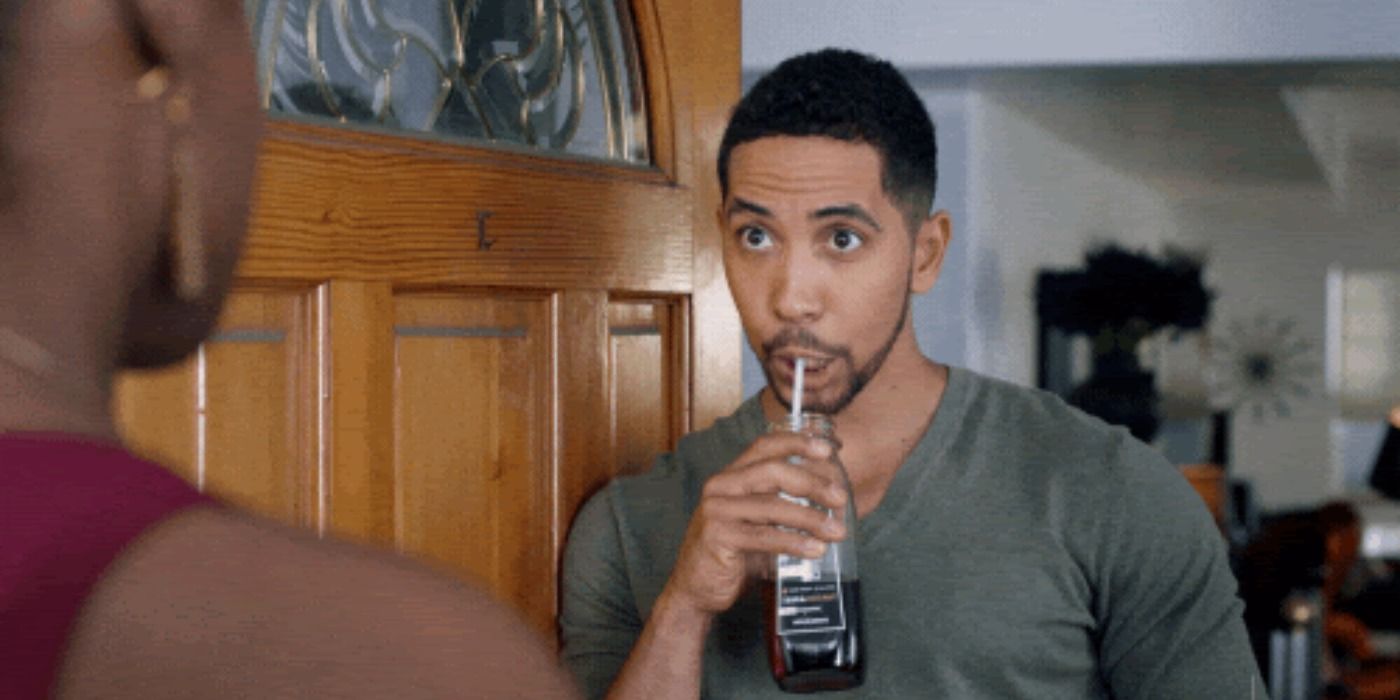 Chad sipping soda in Insecure.