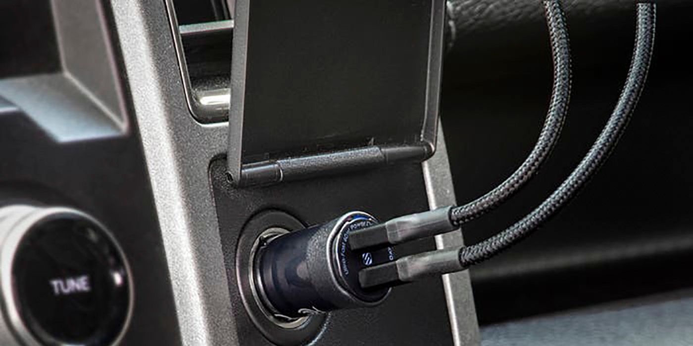 Plug the Scosche Dual Charger into the 12V socket on your car's dashboard.