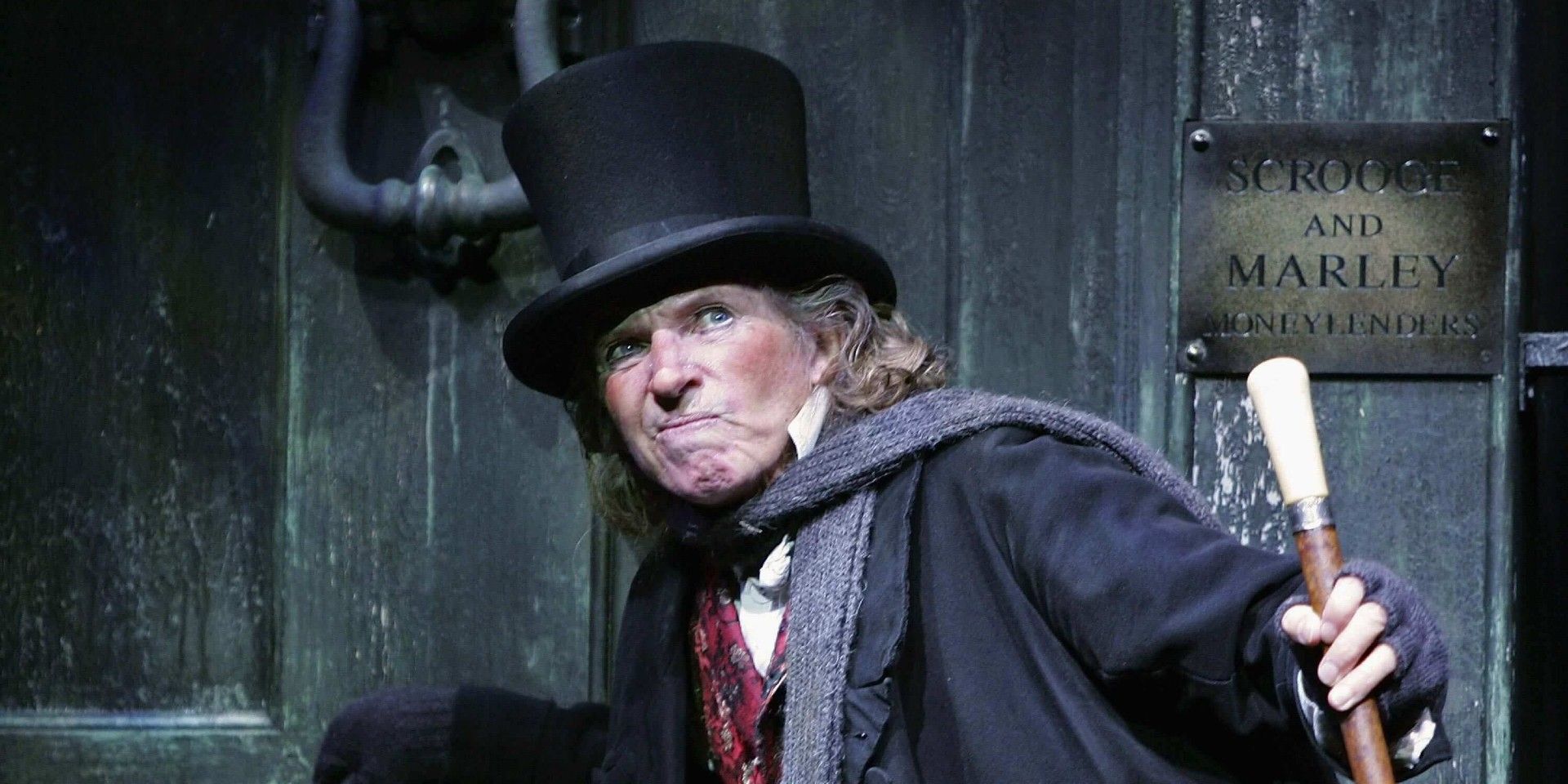 Scrooge on stage in a musica.