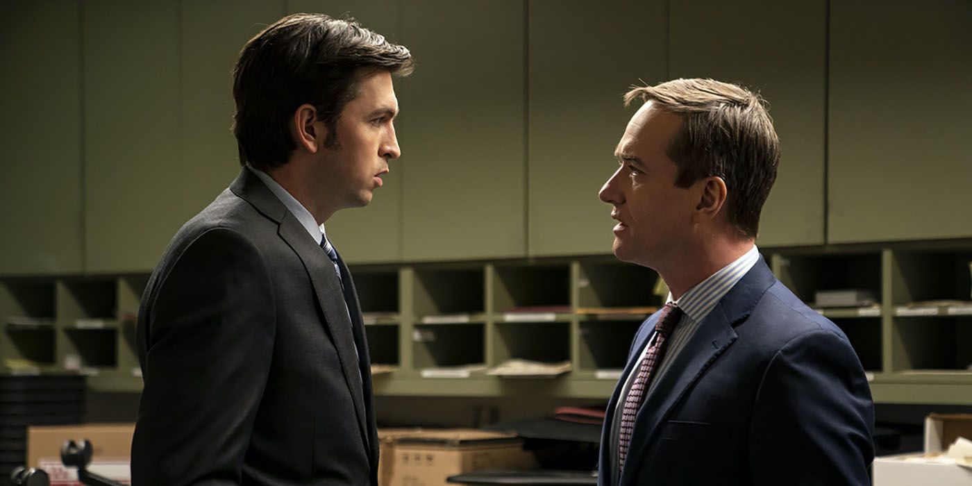 Greg and Tom facing one another in a scene from Succession.