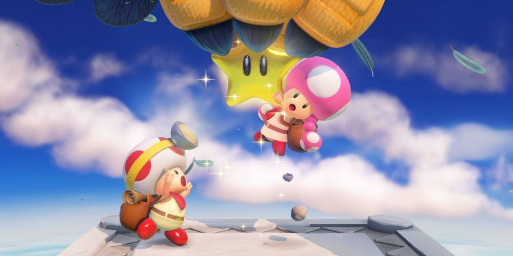 Toad lunges for Toadette as she floats on a balloon
