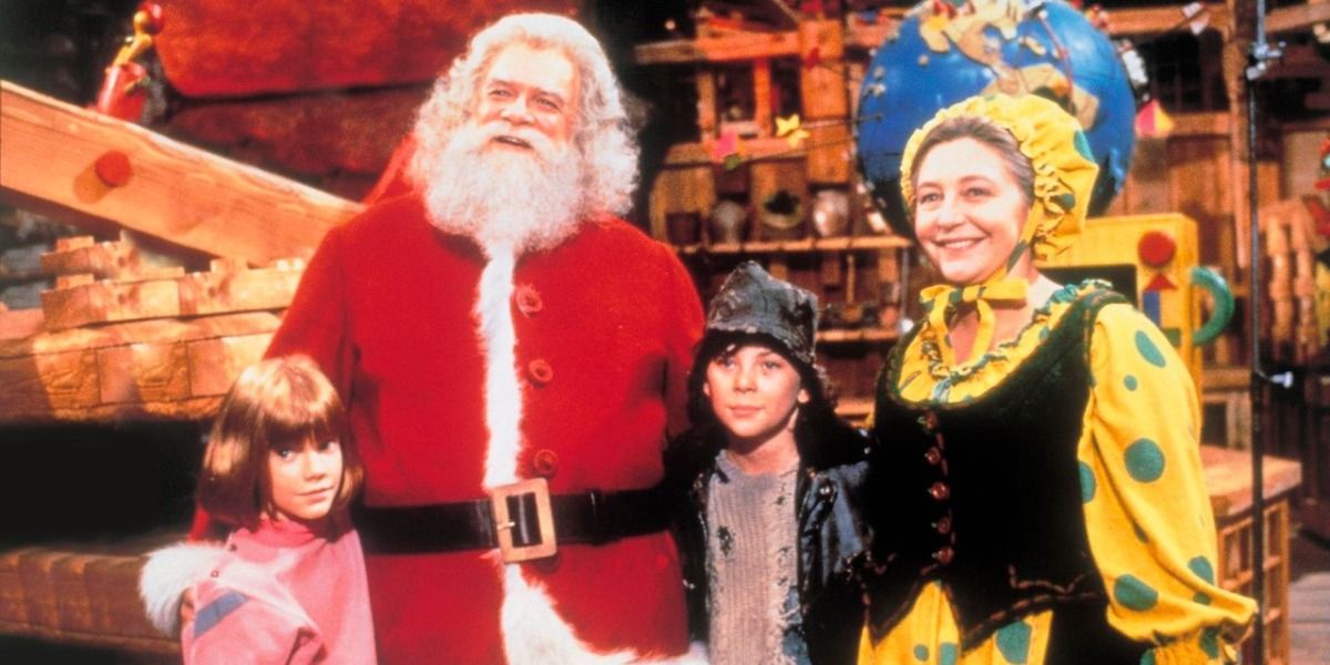 The cast of Santa Claus: The Movie including David Huddleston as Santa