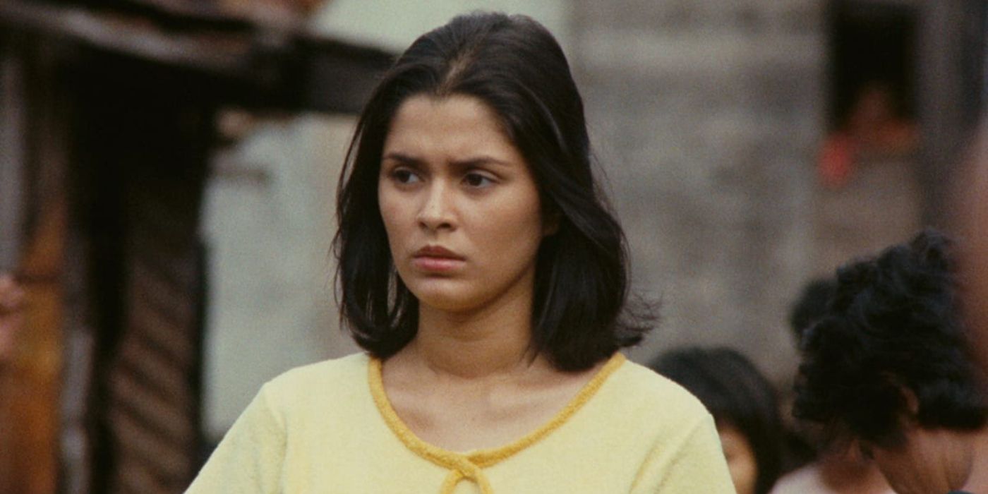 A woman scowls in Insiang.