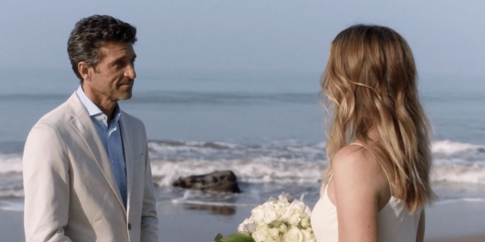 An image of Derek and Meredith having a beach wedding in Grey's Anatomy