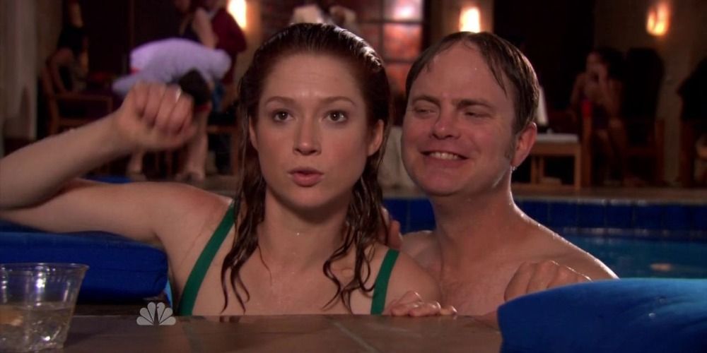 An image of Erin and Dwight swimming in a pool in The Office