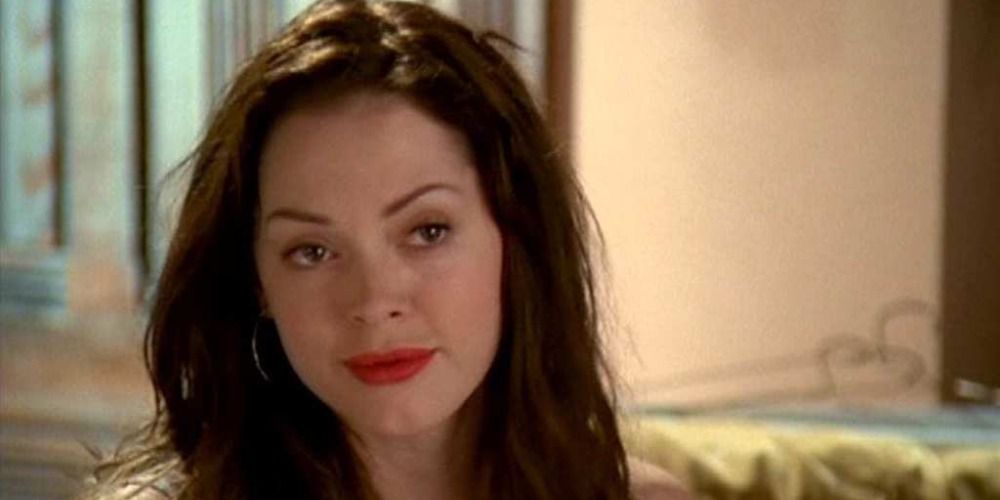 An image of Paige smiling smugly in Charmed