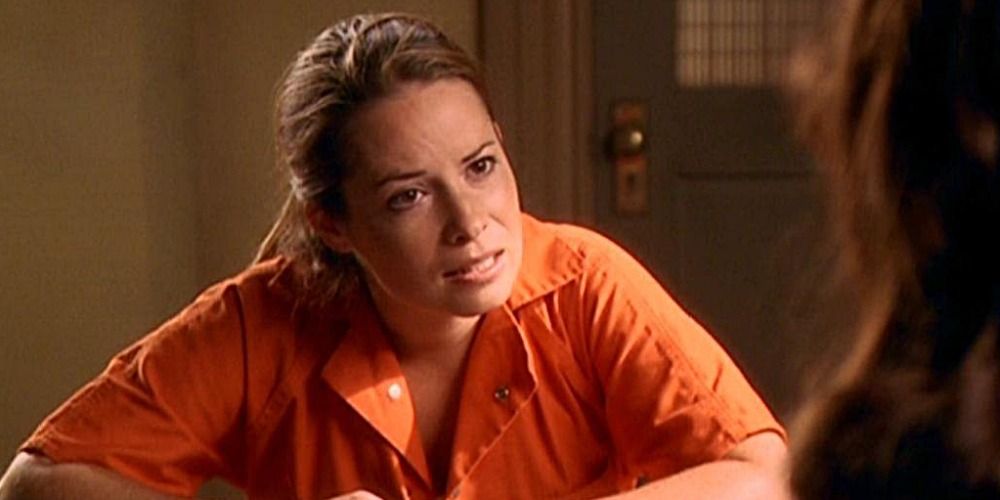 An image of Piper wearing orange overalls in Charmed