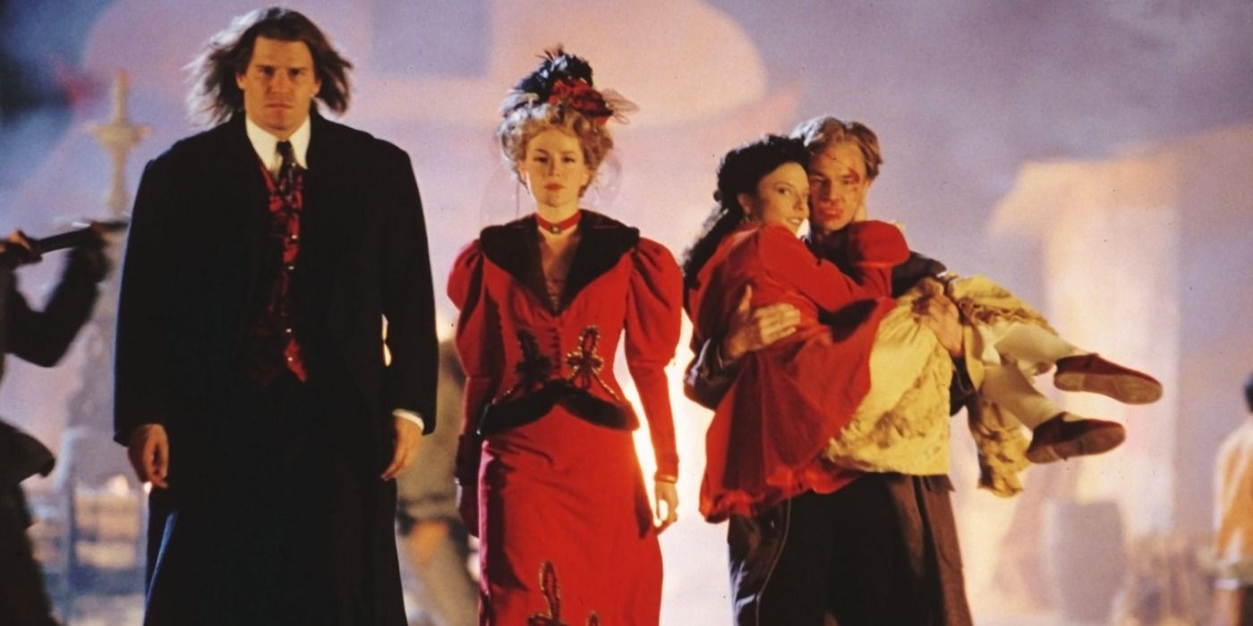 Angelus, Darla, Spike, and Drusilla walking triumphantly in Buffy the Vampire Slayer
