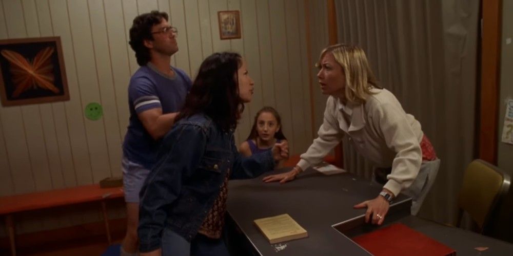 Beth and Neil search for the phone in Wet Hot American Summer.