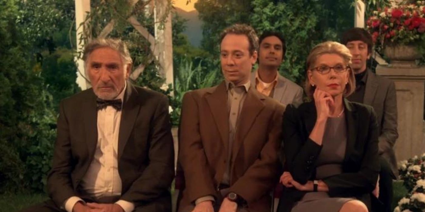 Beverly and Albert sitting with Stuart at Leonard's wedding on TBBT