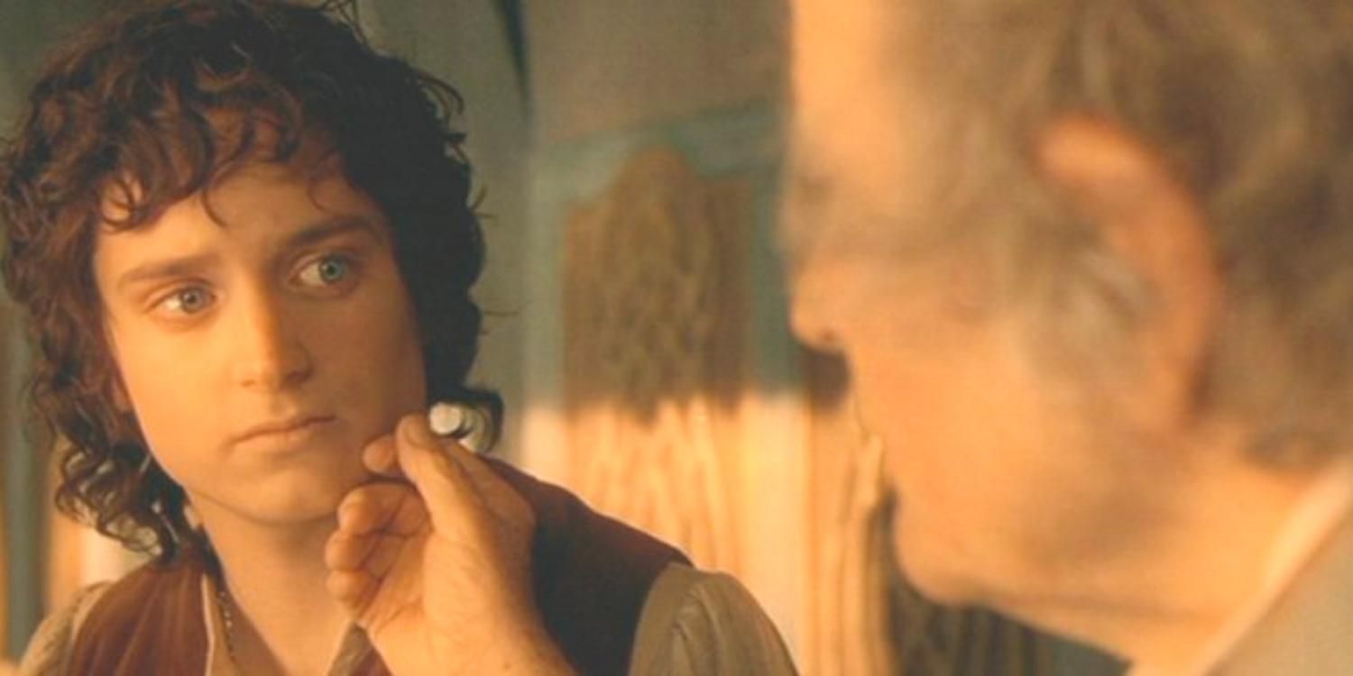 Bilbo touching Frodo’s face in The Lord of the Rings