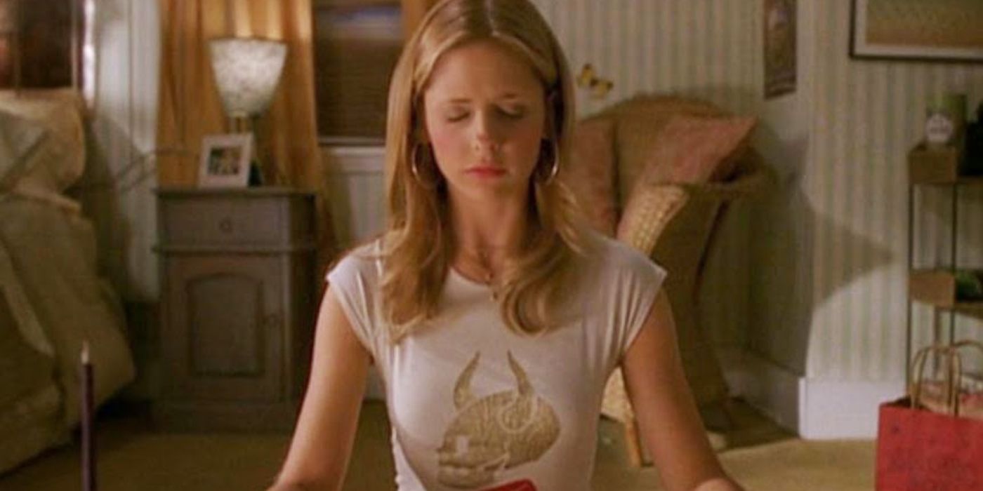 Buffy Summers sitting with her eyes closed in Buffy The Vampire Slayer