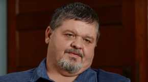 Chris Combs in 1000-lb Sisters looking serious during interview in blue shirt