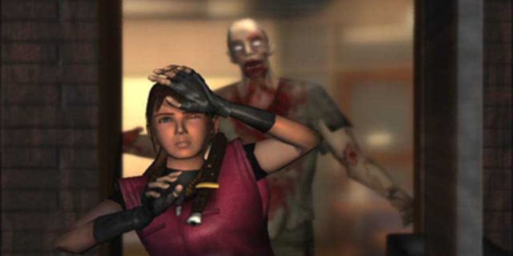 Claire wards off a zombie in Resident Evil 2