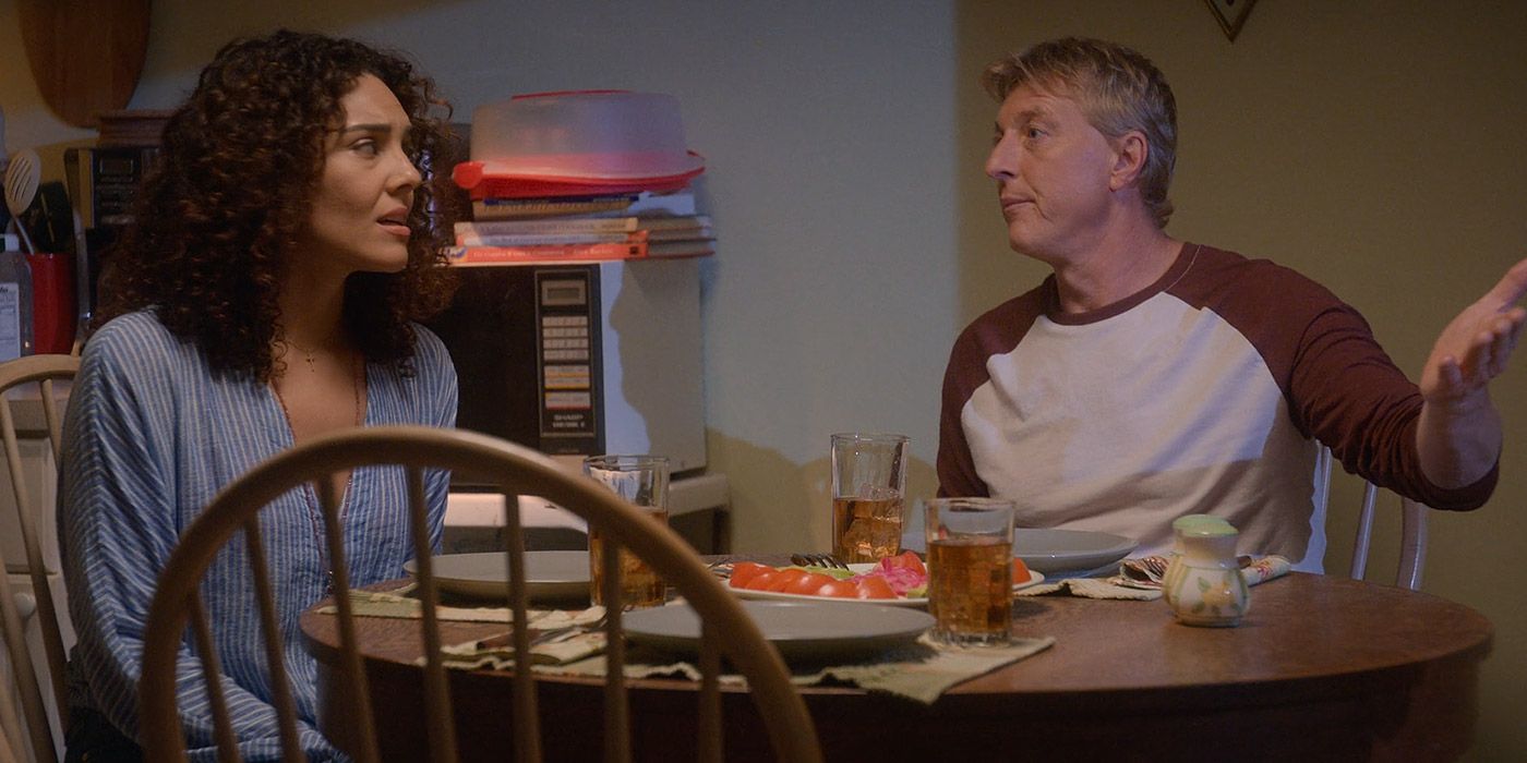 Carmen and Johnny at the dinner table in Cobra Kai